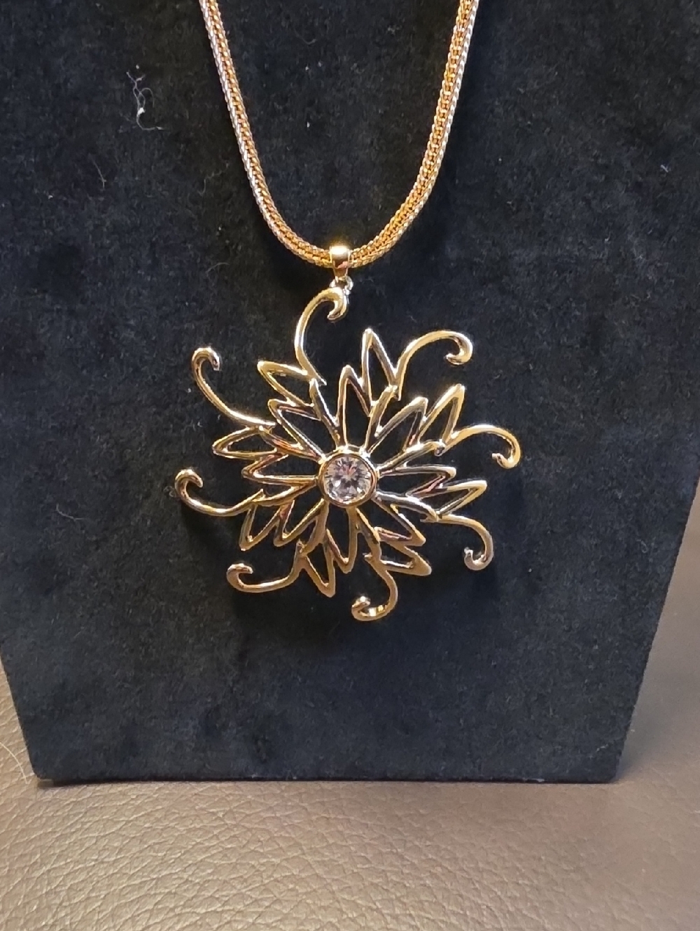 Gold-Tone Floral Sunburst Pendant Necklace with Crystal Accent